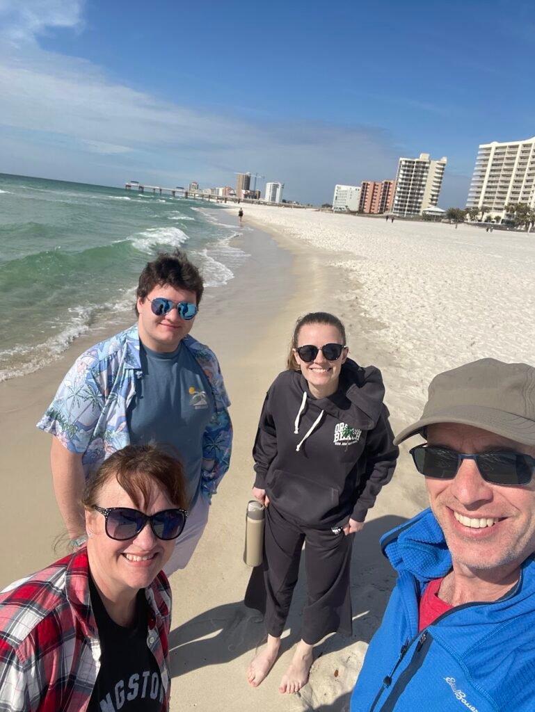Gleasons on the beach Brandy and Matt Gleason and kids on the beach